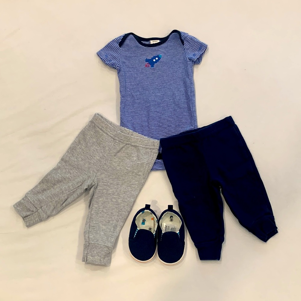 Child of Mine 4 pieces all 0-3 months. 1 bodysuit w/ 2 pants and 1 slip-on shoes